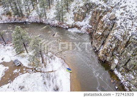 inflatable kayak and packraft on a river - aerial view inflatable kayak and packraft on a river - aerial view 72741920