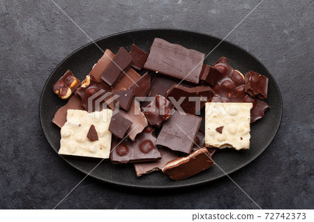 Various chocolate pieces 72742373
