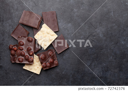 Various chocolate pieces 72742376