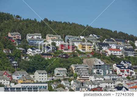 Beautiful view of Alesund, port town on the west coast of Norway, at the entrance to the Geirangerfjord Beautiful view of Alesund, port town on the west coast of Norway, at the entrance to the Geirangerfjord 72743309