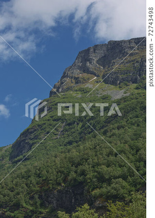 Geiranger fjord, Beautiful Nature Norway. It is a 15-kilometre (9.3 mi) long branch off of the Sunnylvsfjorden, which is a branch off of the Storfjorden (Great Fjord) Geiranger fjord, Beautiful Nature Norway. It is a 15-kilometre (9.3 mi) long branch off of the Sunnylvsfjorden, which is a branch off of the Storfjorden (Great Fjord) 72743498