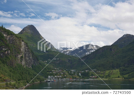 Geiranger fjord, Beautiful Nature Norway. It is a 15-kilometre (9.3 mi) long branch off of the Sunnylvsfjorden, which is a branch off of the Storfjorden (Great Fjord) Geiranger fjord, Beautiful Nature Norway. It is a 15-kilometre (9.3 mi) long branch off of the Sunnylvsfjorden, which is a branch off of the Storfjorden (Great Fjord) 72743500