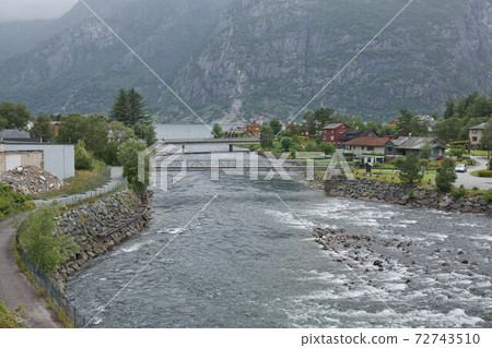 The village of Eidfjord in Norway is a major cruise ship port of call. It is situated at the end of the Eid Fjord, an inner branch of the large Hardangerfjorden 72743510