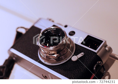 Leica film camera on the desk Leica film camera on the desk 72744231