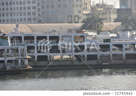 Medium-sized ship parked at Shodrugat, Dhaka, Bangladesh Retro hull and guest rooms Medium-sized ship parked at Shodrugat, Dhaka, Bangladesh Retro hull and guest rooms 72745442