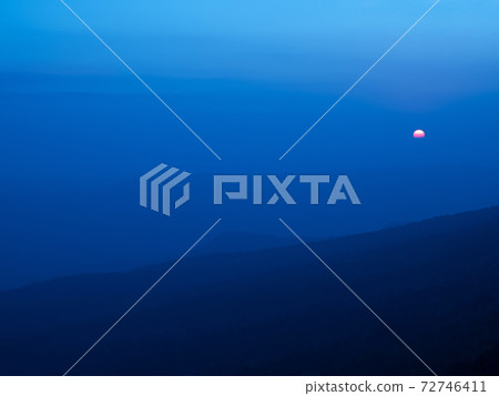 Dramatic sunset gradient shade mountain landscape of Phu Kradueng National park. Thailand. cold tone image Dramatic sunset gradient shade mountain landscape of Phu Kradueng National park. Thailand. cold tone image 72746411