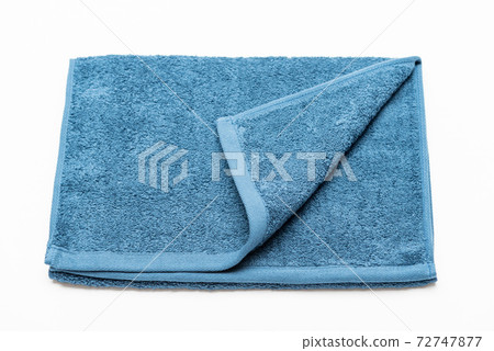 Blue face towel taken on a white background 72747877