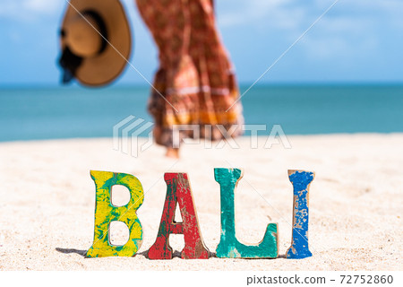 Bali sea and traveler woman Bali sea and traveler woman 72752860