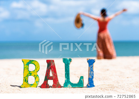 Bali sea and traveler woman Bali sea and traveler woman 72752865