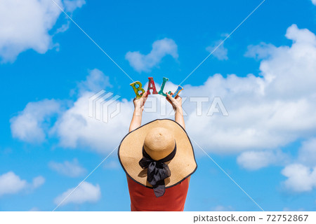 Image of Bali trip Women and blue sky Image of Bali trip Women and blue sky 72752867