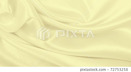 Smooth elegant golden silk or satin luxury cloth texture as wedding background. Luxurious background design. In Sepia toned. Retro style 72753258