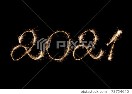 2021 New Year inscription with sparklers . 72754640