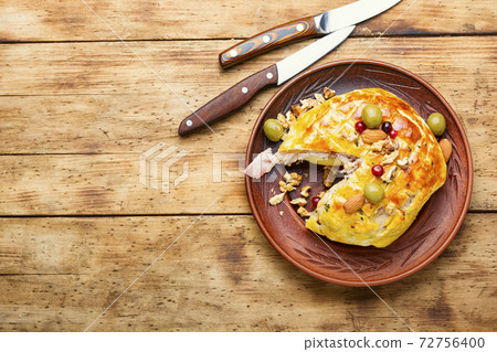 Camembert cheese baked in bacon Camembert cheese baked in bacon 72756400