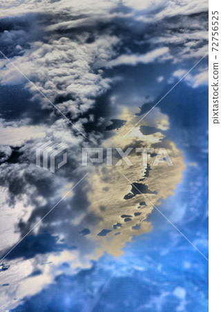 Clouds pass under wing of plane Clouds pass under wing of plane 72756525