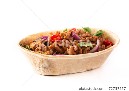 Mexican barquita taco with beef, chilli, tomato, onion and spices Mexican barquita taco with beef, chilli, tomato, onion and spices 72757257