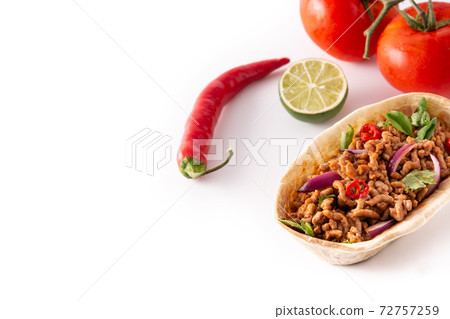 Mexican barquita taco with beef, chilli, tomato, onion and spices Mexican barquita taco with beef, chilli, tomato, onion and spices 72757259