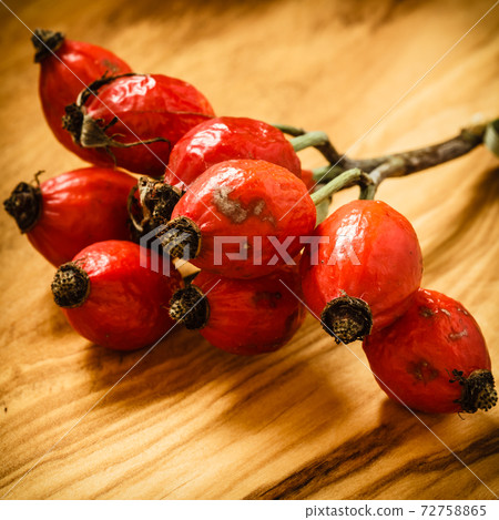 Hawthorn on wooden table background Hawthorn on wooden table background 72758865