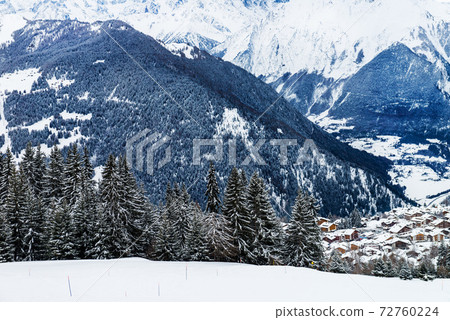 Winter view on the valley in Swiss Alps, Verbier, Switzerland Winter view on the valley in Swiss Alps, Verbier, Switzerland 72760224