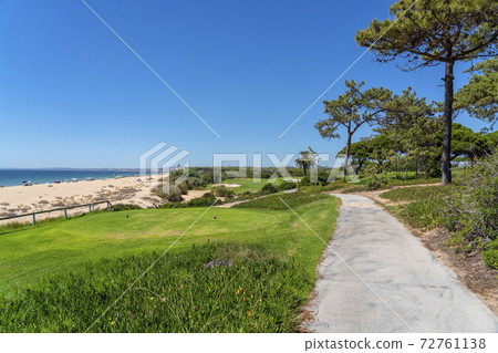 Resort luxury beaches, golf courses with palm trees, overlooking the sea for tourists to relax. 72761138