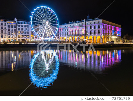 The ferris wheel at night in Bayonne, France The ferris wheel at night in Bayonne, France 72761759
