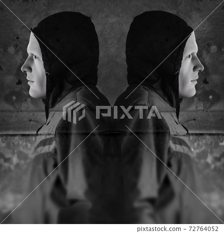 twin hooded figures 72764052