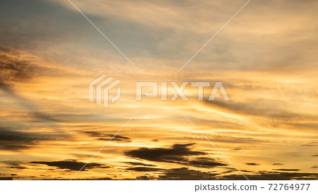 Dramatic clouds at sunset with cityscape silhouette. Abstract season weather vacation time. Dramatic clouds at sunset with cityscape silhouette. Abstract season weather vacation time. 72764977
