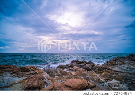 Sea Ocean with Smooth Wave and Rock landscape with blue sky. Nature of Seascape vacation time. 72764984