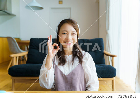 A woman with a headset A woman with a headset 72768815