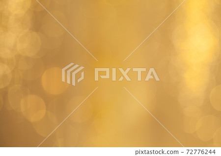 Golden bokeh Christmas glitter holiday glowing backdrop blurry background 72776244