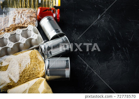Food set for home delivery or donation with space for text,on black background Food set for home delivery or donation with space for text,on black background 72778570