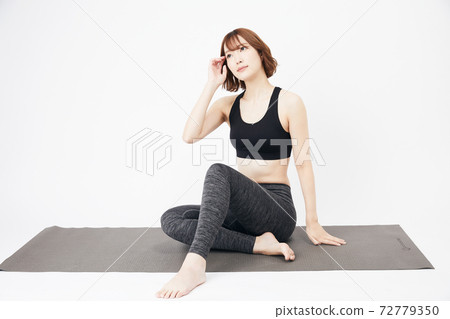 Stretch sports yoga training exercise flexible young women Stretch sports yoga training exercise flexible young women 72779350