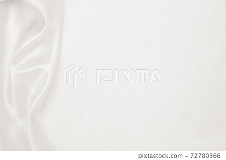 Smooth elegant golden silk or satin luxury cloth texture as wedding background. Luxurious background design. In Sepia toned. Retro style Smooth elegant golden silk or satin luxury cloth texture as wedding background. Luxurious background design. In Sepia toned. Retro style 72780366