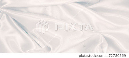 Smooth elegant grey silk or satin luxury cloth as wedding background. Luxurious Christmas background or New Year background design 72780369