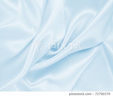 Smooth elegant blue silk or satin luxury cloth texture as abstract background. Luxurious background design Smooth elegant blue silk or satin luxury cloth texture as abstract background. Luxurious background design 72780370