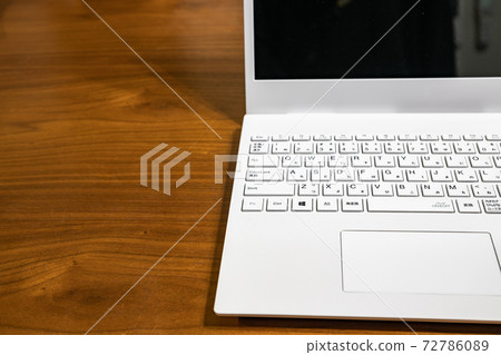 Keyboard and wood table 72786089