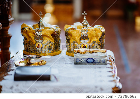 crowns on Lectern. a high table with a sloping top for liturgical books 72786662
