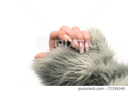 Closeup of hand of woman with beautiful nails on white background 72789340