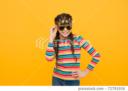 Party celebration. Celebrate as real queen. Kid wear golden crown. 72791016