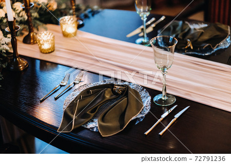 wedding table decoration on the table in the castle, Cutlery on the table 72791236