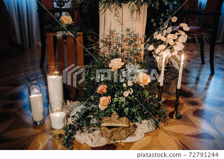wedding table decoration with flowers on the table in the castle, table decor for dinner by candlelight.Dinner with candles 72791244