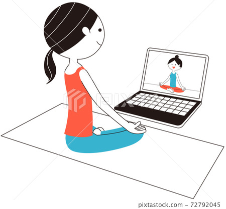 A woman doing ska asana (an easy pose) while receiving online yoga at zoom 72792045