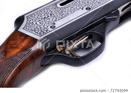 Shotgun trigger mechanism isolated on white background Shotgun trigger mechanism isolated on white background 72793094