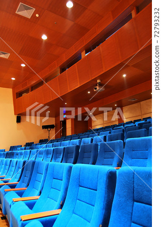 Modern cinema or theater hall empty and blue comfortable seats 72793232