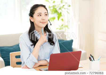Woman making a video call Woman making a video call 72796068