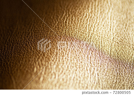 Gold-colored synthetic leather (background material) 72800505