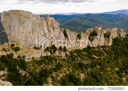 Aerial view of Castle ruin Peyrepertuse in the Aude in France Aerial view of Castle ruin Peyrepertuse in the Aude in France 72800861