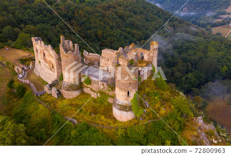 Drone view of remains of Chateau Rocher on cliff, France Drone view of remains of Chateau Rocher on cliff, France 72800963