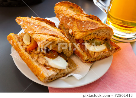 Sandwich with eggs, anchovies 72801413
