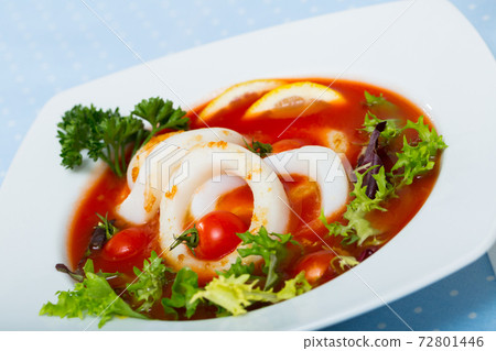 Bowl with tomato soup with squid Bowl with tomato soup with squid 72801446