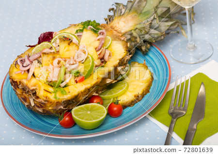 Salad with calamari, pineapple and lime Salad with calamari, pineapple and lime 72801639